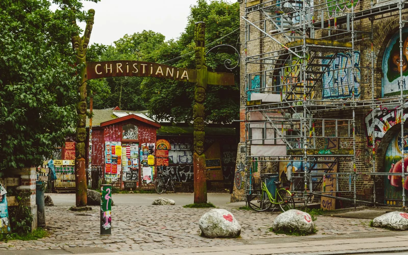 The entrance to Christiania with its carved wooden sign and colourful graffiti in Christianshavn